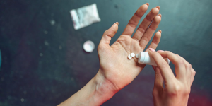 woman holding methotrexate abortion pills